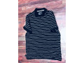 instant-une-nouvelle-deballage-de-t-shirt-polo-a-la-boutique-nous-sommes-situes-a-la-patte-doie-derriere-lyza-market-small-1