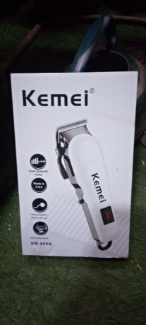 des-tondeuse-a-cheveux-sans-fil-professionnelle-rechargeable-marque-kemei-km-809a-big-0