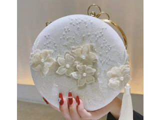 Élégance Rétro : Sac Rond Vintage Brodé